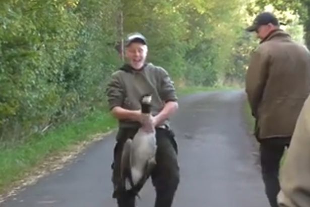 Other hunt stewards could be heard laughing loudly as the boy played around with the bird
