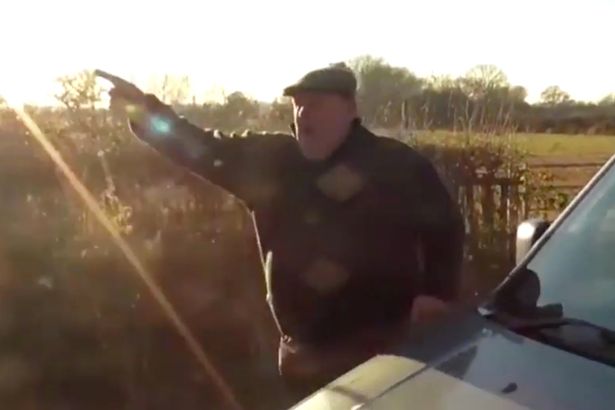 The heavily built yob yells a string of vile abuse at the hunt saboteur in the video