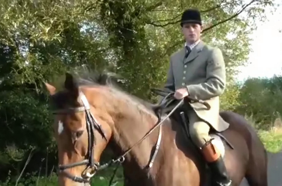 A huntsman on horseback can also be heard saying off camera: ‘Take his f****** camera Stewie’