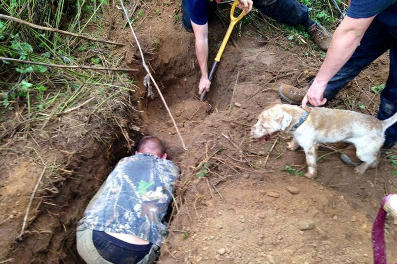 A mobile phone photograph shows unidentified individuals digging out a set at an unknown location