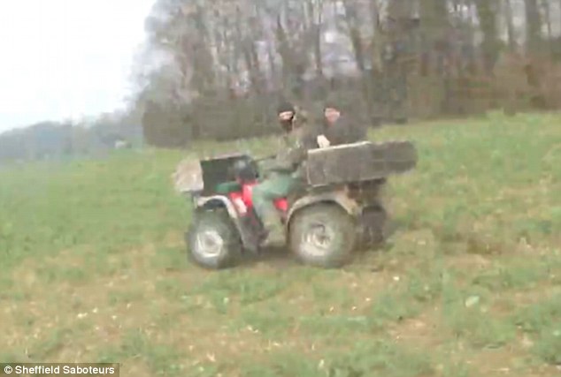 Threatening: One of the men on the quad bike appears to suggest his friend turns a gun on the saboteurs. There is no suggestion the Hunt is connected to the incident