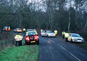 Surrey Police arrive to support the hunt